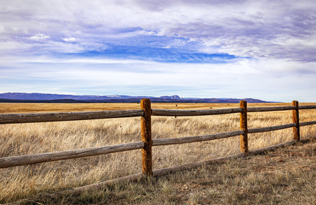 Wooden fence in the prairie, New Mexico, United States.の写真素材