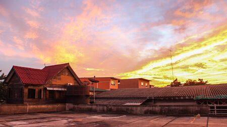 The house silhouette on the sun set backgroundの写真素材