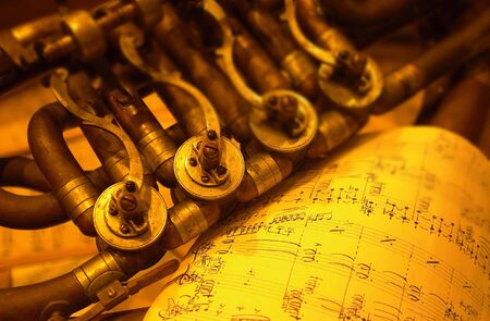    Detail of an old brass instrument                            の写真素材