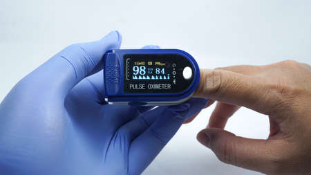 Pulse oximeter used to measure pulse rate and oxygen levelsのeditorial素材