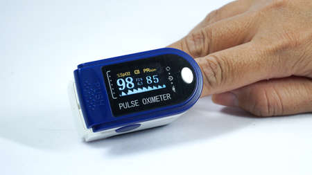 Pulse oximeter used to measure pulse rate and oxygen levelsのeditorial素材