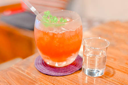 Iced tea with beakerの写真素材