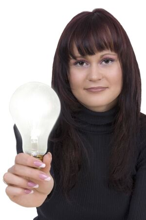 Woman with lightbulb against a white backgroundの写真素材
