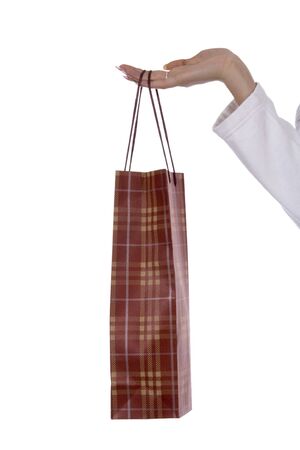 Bag in hands against a white background の写真素材