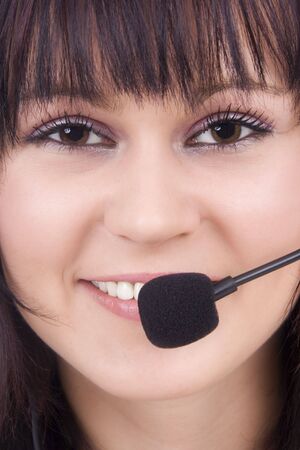 Woman telephonist with hands-free phoneの写真素材