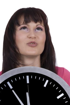 Emotive woman with o'clock against a white backgroundの写真素材