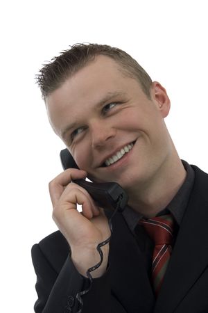 Merry male telephonist against white background  の写真素材