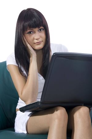 Sitting woman with notebook on white backgroundの写真素材