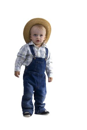 Attractive boy straw hat on egg white backgroundの写真素材