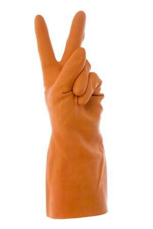 Arm in orange gloves with by two outstretched fingers gesture,symbol .On white background.の写真素材
