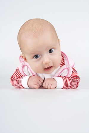 Merry little girl,on white background.の写真素材