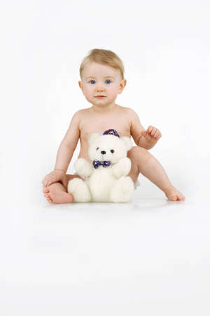  Girl with plushy toy,on white backgroun.の写真素材