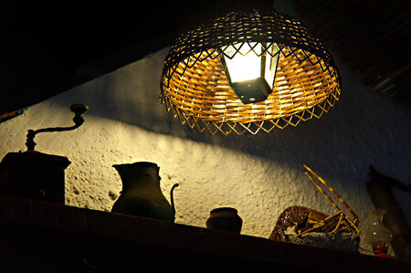 Detail close-up of a rural village house interior with lamp and shelveのeditorial素材