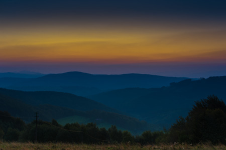 Sunrise scenery in hills before the Sun comes up and appearsの写真素材