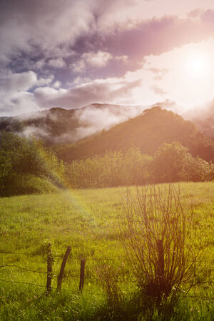 Mountains in clouds during a spring morning in Ukraineの写真素材