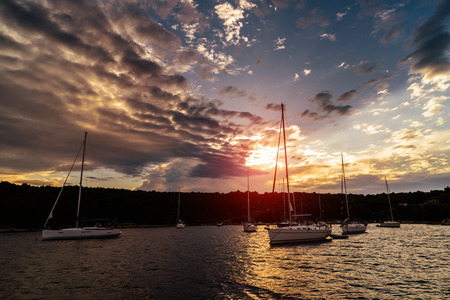 Sunset over an island bay in Dalmatia, Croatiaの写真素材