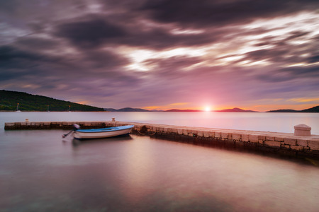 Sunset over an island bay in Dalmatia, Croatiaの写真素材