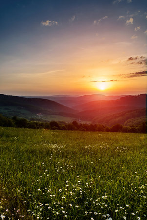 Morning in mountains with Sun rising rural sceneryの写真素材