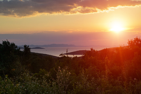Sunset over an island bay in Dalmatia, Croatiaの写真素材