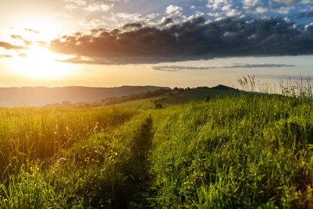 Morning in mountains with Sun rising rural sceneryの写真素材