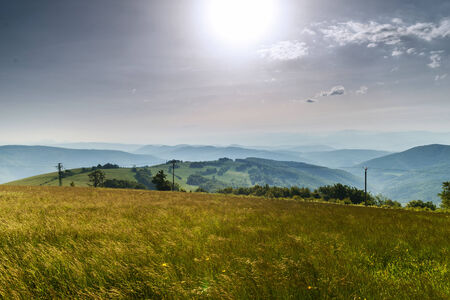 Morning in mountains with Sun rising rural sceneryの写真素材