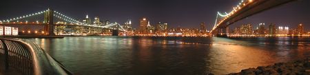 Two bridges with Brooklyn one by night - New York - Panorama.の写真素材