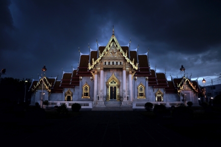 benchamabophit temple under dark cloudsの写真素材