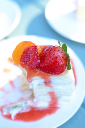 Strawberry Cheesecake slide on dishesの写真素材