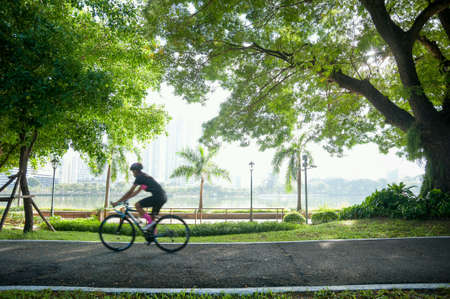 Bicycling in parkの素材