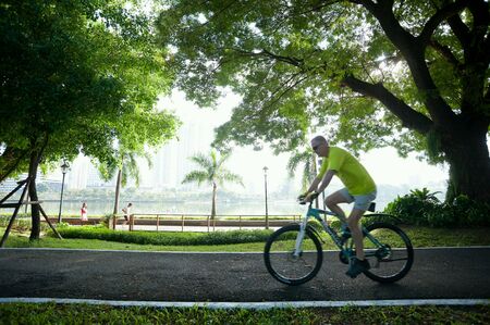 Bicycling in parkの素材