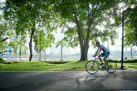 Bicycling in parkの素材