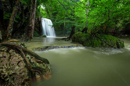 Waterfall in forest at Erawan waterfall National Park, Kanchanaburi, Thailandの写真素材