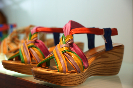 Colorful women s shoes made of wood and leatherの写真素材