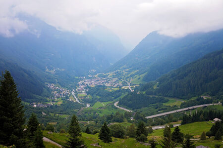 Village view in Swetzerland on a foggy day from aboveの写真素材
