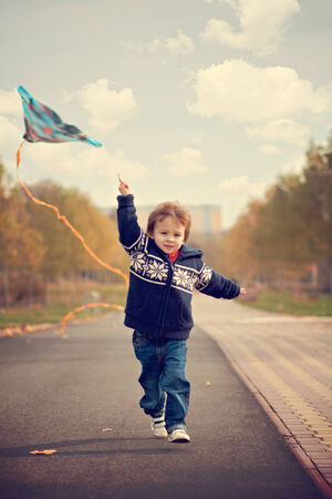 Boy with kite の写真素材
