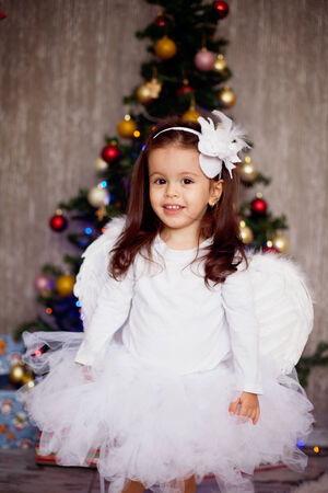 Little girl with christmas hat の写真素材