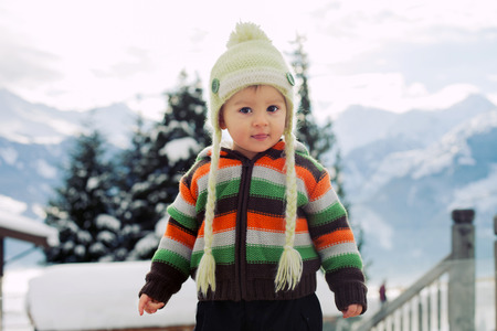 Winter snowy portrait of a boy