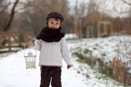 Boy outside in the snowの写真素材