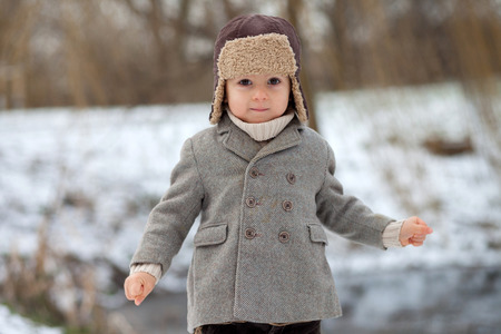 Boy outside in the snowの写真素材