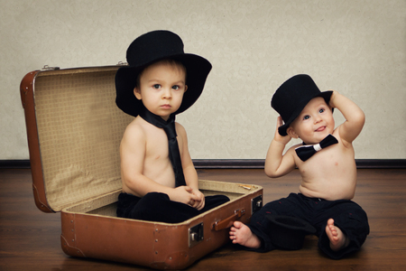 Brothers, making funny faces の写真素材