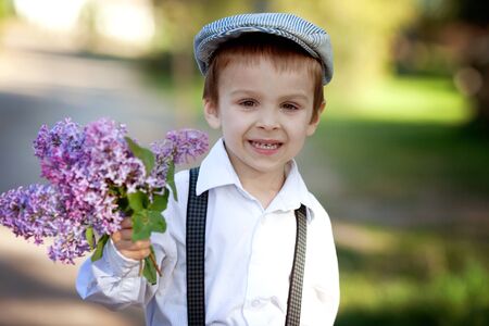 Little boy with suitcase and map, travelingの写真素材