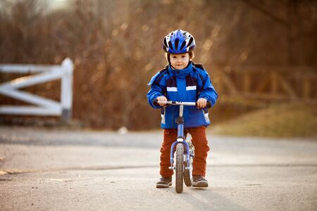 Little boy, riding on a balance bikeの写真素材