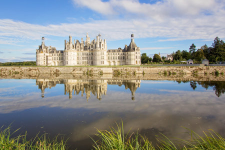 Chateau de Chambord, royal medieval french castle with reflection in the water canal in front of it at Loire Valley, France, Europeのeditorial素材