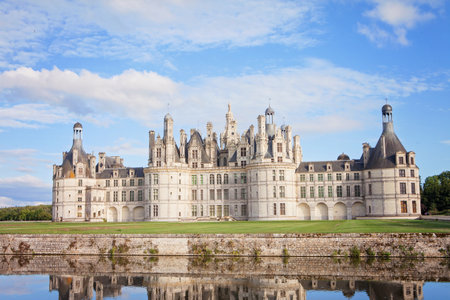Chateau de Chambord, royal medieval french castle with reflection in the water canal in front of it at Loire Valley, France, Europeのeditorial素材