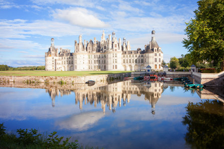 Chateau de Chambord, royal medieval french castle with reflection in the water canal in front of it at Loire Valley, France, Europeのeditorial素材