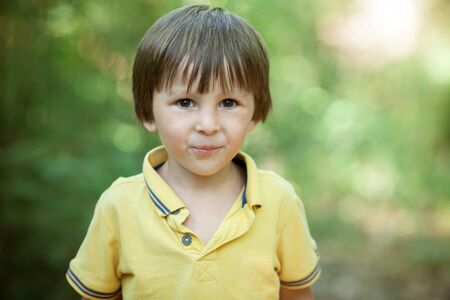 Close portrait of Handsome Young Boy, outdoors