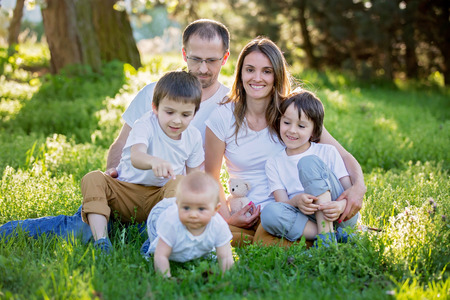 Big family, having their portrait taken springtime