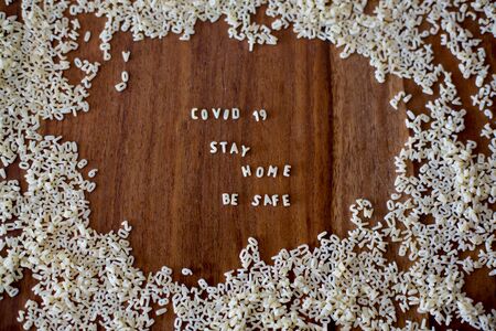 Coronavirus sign saying stay home and be safe, covid 19 warningの写真素材