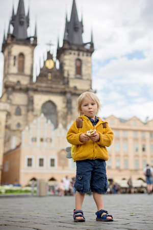 Cute child, boy, visiting Prague after the quarantine Covid 19, empty streetsの写真素材