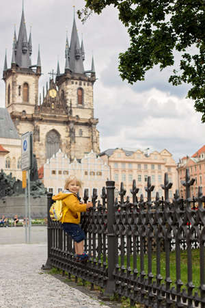 Cute child, boy, visiting Prague after the quarantine Covid 19, empty streetsの写真素材